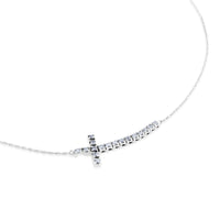 Colgante de oro blanco con cruz horizontal de diamantes