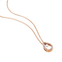 Colgante de oro rosa con lágrima de pavé de diamantes y diamante al aire
