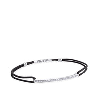Pulsera de oro blanco y cordón negro con hilera de diamantes