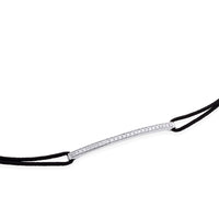 Pulsera de oro blanco y cordón negro con hilera de diamantes