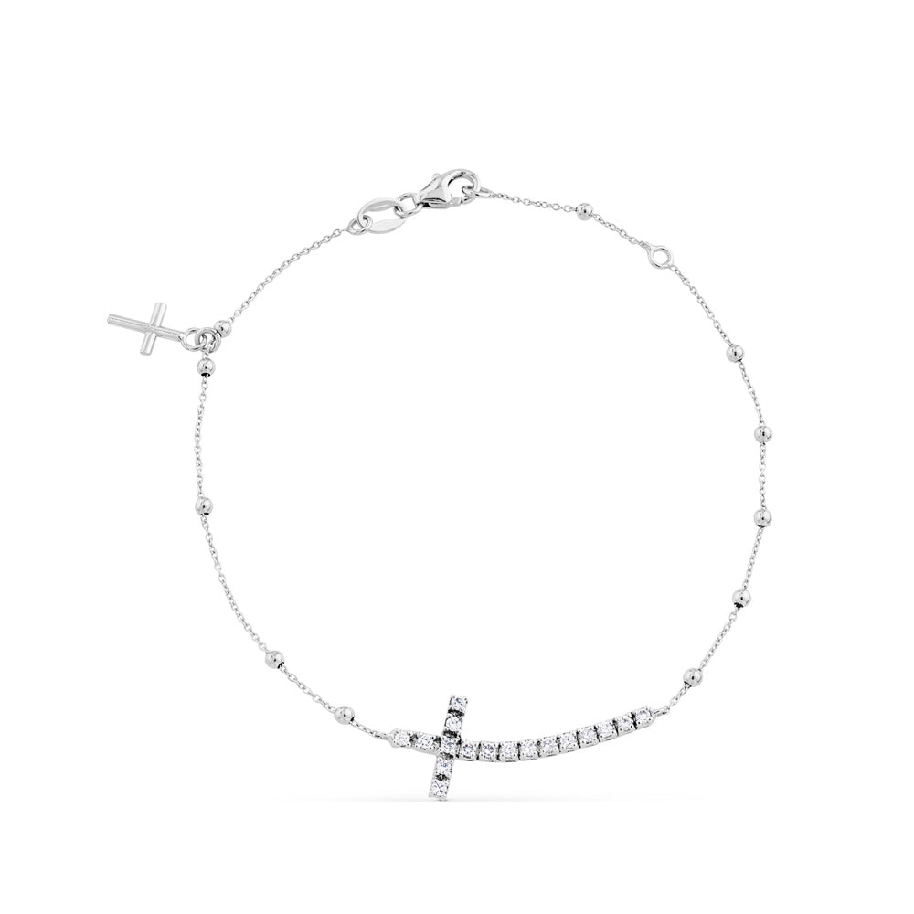 Pulsera de oro blanco con cruz horizontal de diamantes