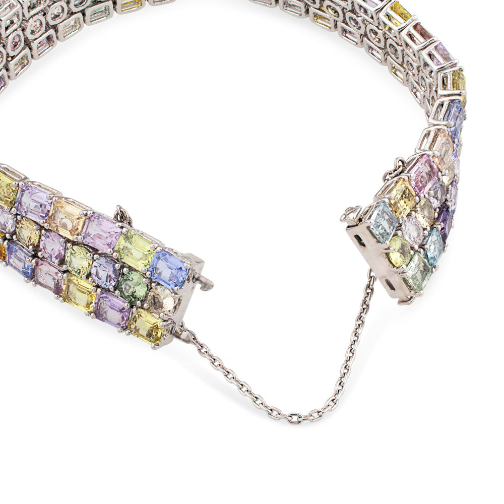 Pulsera de oro blanco con tres hileras de zafiros multicolor
