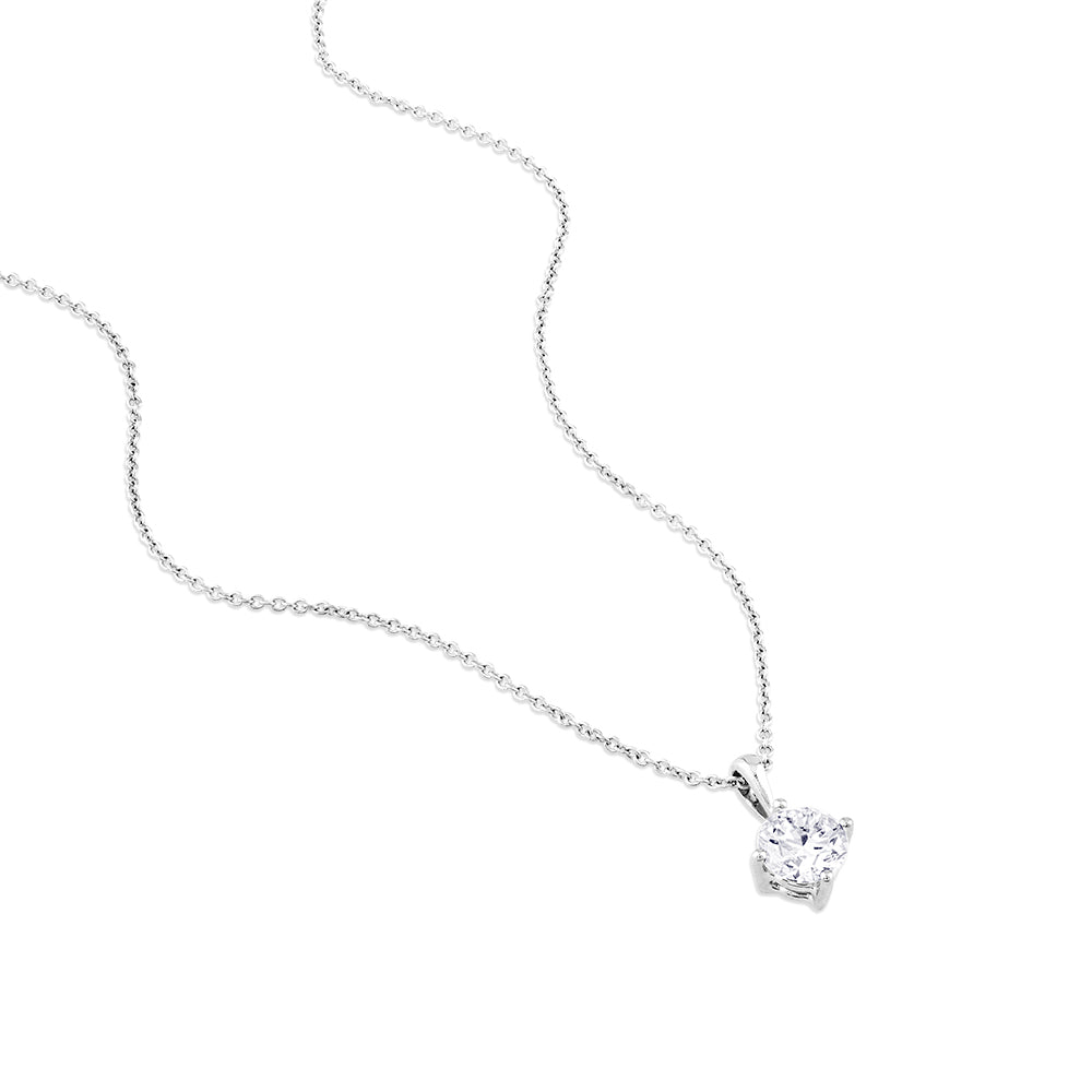 Colgante de oro blanco con diamante en 4 garras de 0,59 quilates