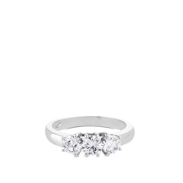 Tresillo de oro blanco con diamantes engastados en 4 garras