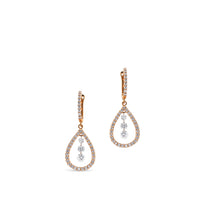 Pendientes largos de oro rosa con lágrima de diamantes y 3 diamantes al aire