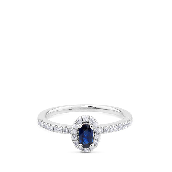 Sortija "Royal Trilogy" de oro blanco con diamantes y zafiro con orla de pavé de diamantes