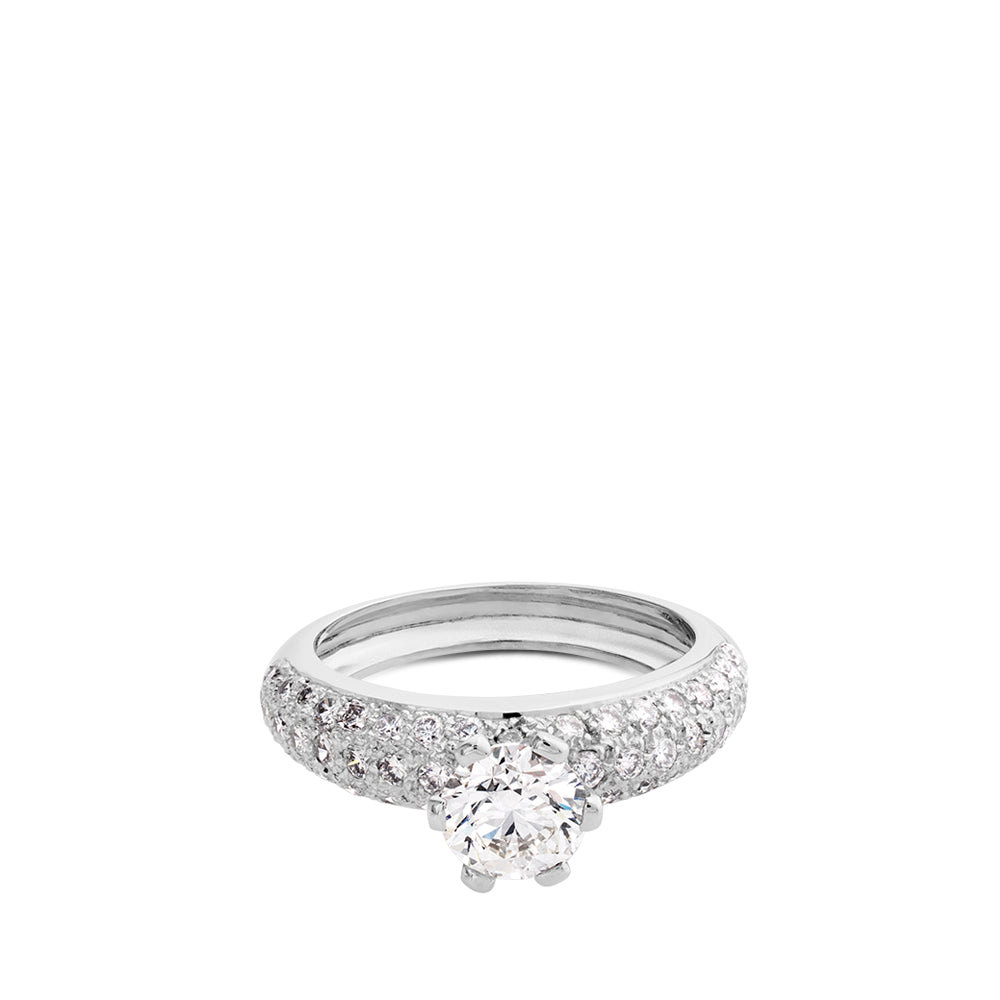 Solitario de oro blanco con 6 garras y pavé de diamantes laterales