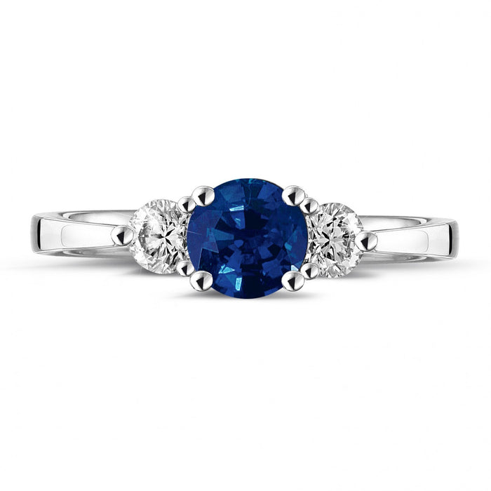 Anillo Royal Trilogy de oro blanco con dos diamantes talla brillante y zafiro talla redonda