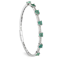 Pulsera Royal Trilogy de oro blanco con esmeraldas talla princesa  y diamantes talla brillante