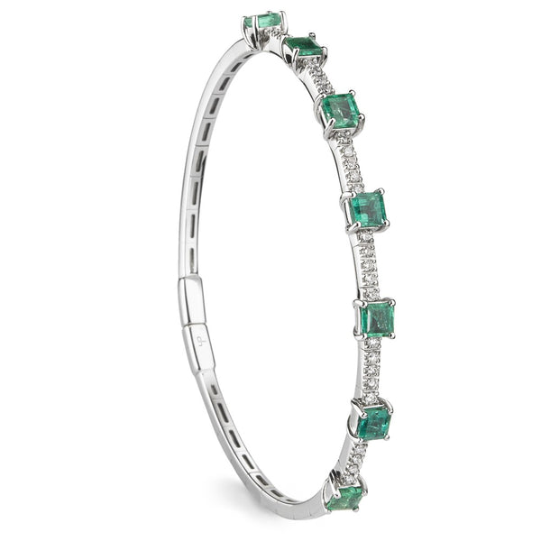 Pulsera Royal Trilogy de oro blanco con esmeraldas talla princesa  y diamantes talla brillante