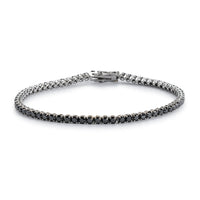 Pulsera_Riviere_ oro_blanco_con_brillantes_negros_en garra