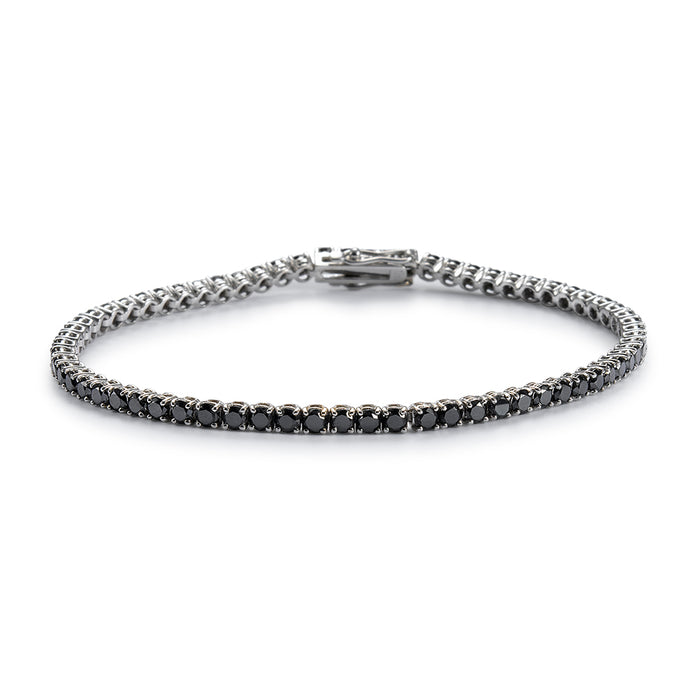 Pulsera_Riviere_ oro_blanco_con_brillantes_negros_en garra