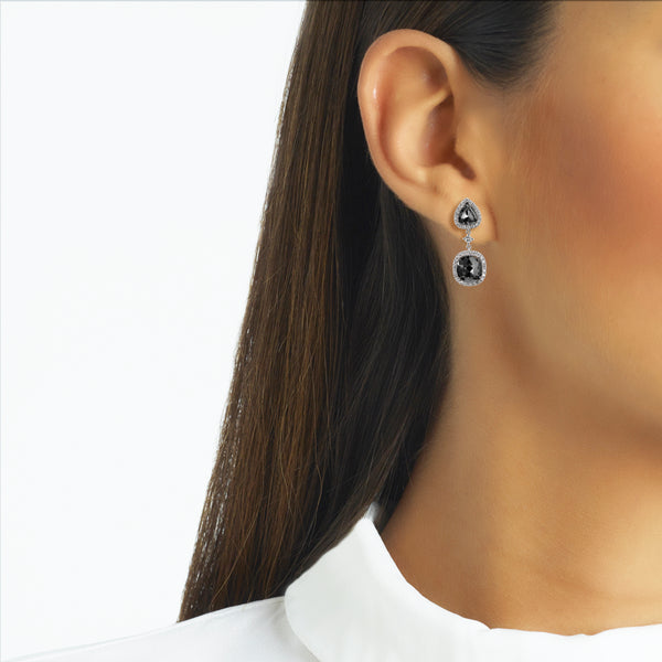 Pendientes de oro blanco con diamantes talla brillantes blancos y negros