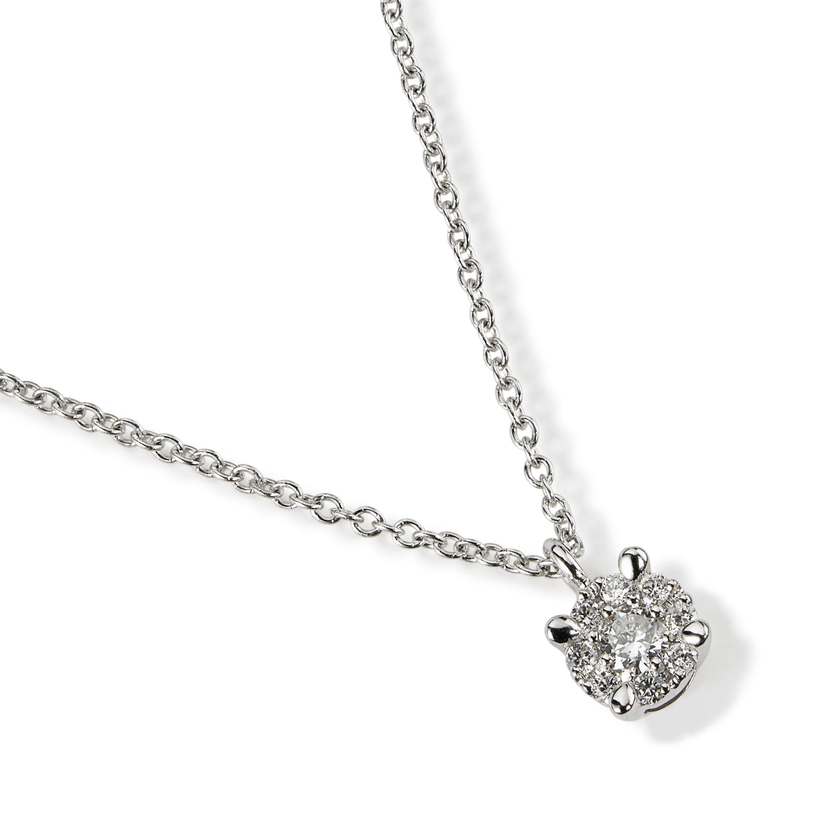 Colgante de oro blanco con diamante talla brillante y orla de diamantes con engaste invisible