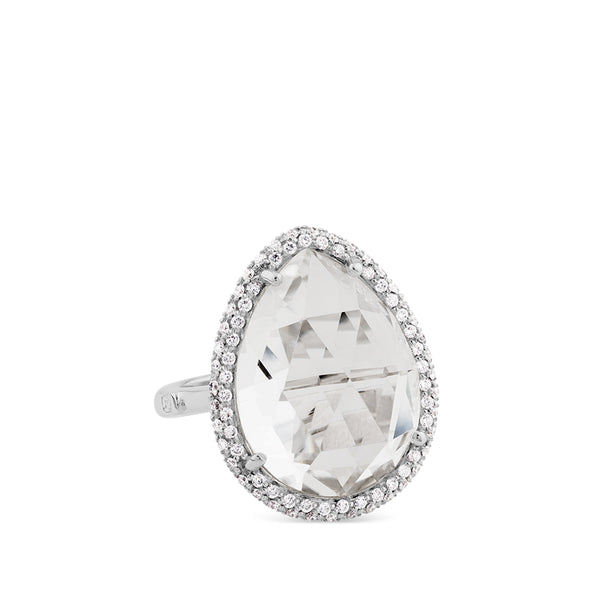 Sortija de oro blanco con topacio blanco talla marquise y orla de pavé de diamantes