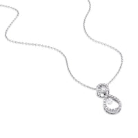 Colgante de oro blanco con círculo y lágrima de pavé de diamantes y dos diamantes al aire