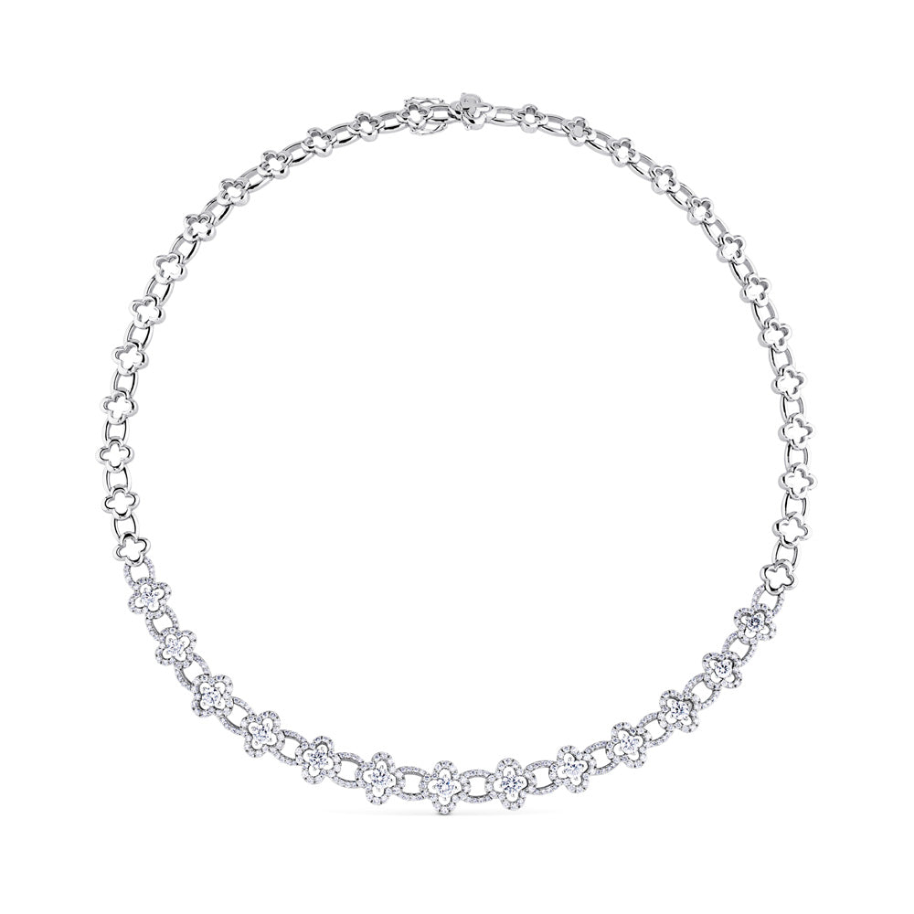 Gargantilla oro blanco de flores con diamantes engastados.