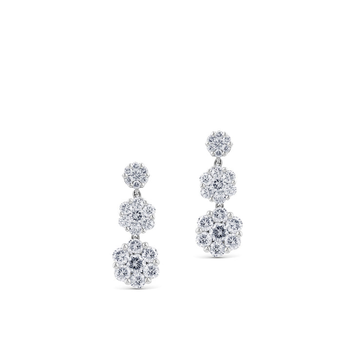 Pendientes largos de oro blanco con 3 flores de diamantes