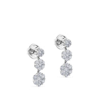 Pendientes largos de oro blanco con 3 flores de diamantes