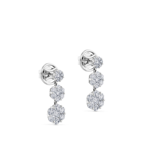 Pendientes largos de oro blanco con 3 flores de diamantes