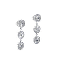 Pendientes largos de oro blanco desmontables con tres círculos de diamantes