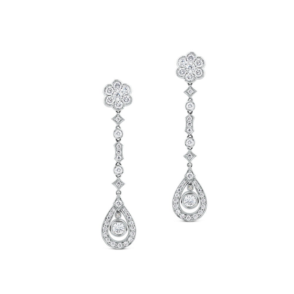 Pendientes largos de oro blanco con diamantes, flor y lágrima de diamantes