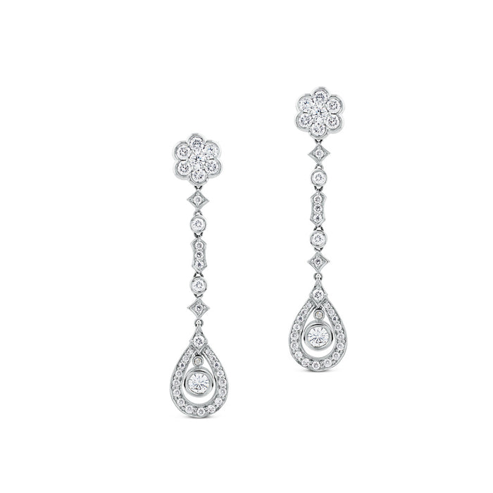 Pendientes largos de oro blanco con diamantes, flor y lágrima de diamantes
