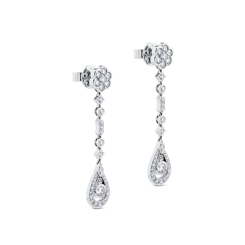 Pendientes largos de oro blanco con diamantes, flor y lágrima de diamantes