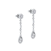 Pendientes largos de oro blanco con diamantes, flor y lágrima de diamantes