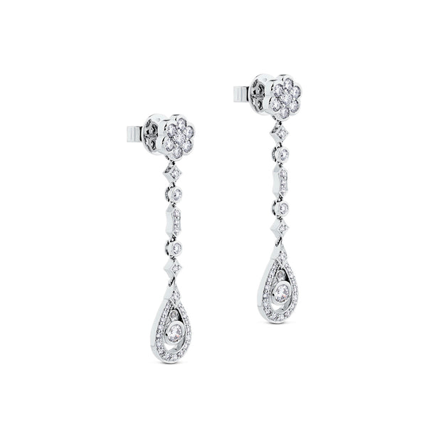 Pendientes largos de oro blanco con diamantes, flor y lágrima de diamantes