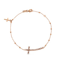 Pulsera de oro rosa con cruz horizontal de diamantes