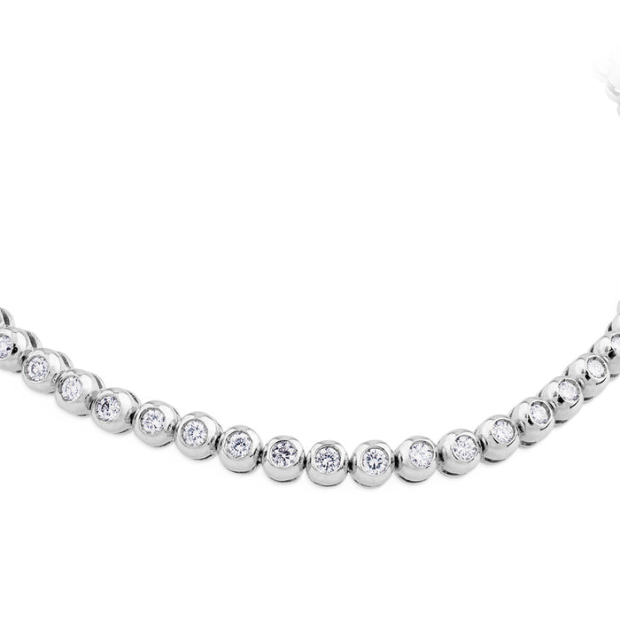 Pulsera Riviere de oro blanco con diamantes en chatón de 1,31 quilates