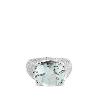 Sortija de oro blanco ancha con aguamarina oval y pavé de diamantes