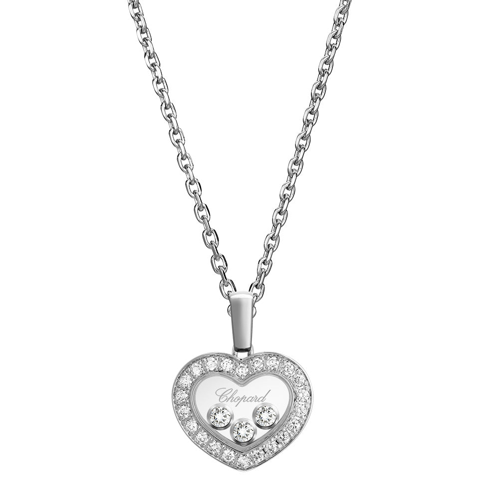 Colgante de oro blanco con corazón de brillantes y tres diamantes móviles entre dos cristales de zafiro.