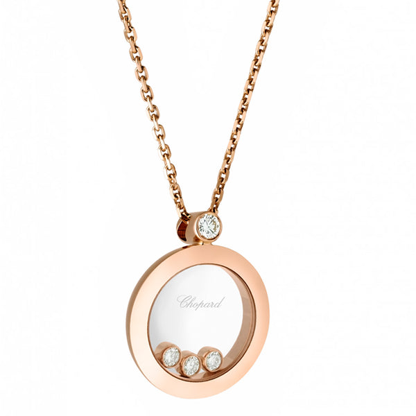 Colgante de oro rosa en forma de círculo y diamante fijo, y tres diamantes móviles entre dos cristales de zafiro.