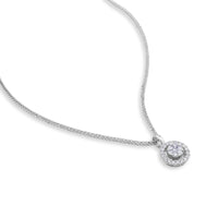 Colgante de oro blanco con círculo y orla de pavé de diamantes de 0,23 quilates