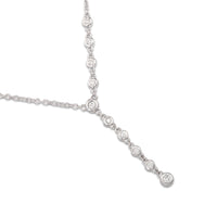 Colgante de oro blanco con diamantes en chatón