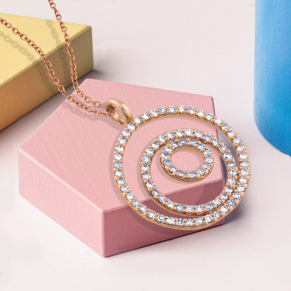 Colgante_GeometriCh_de_oro_rosa_con_círculos_de_pavé_de_diamantes