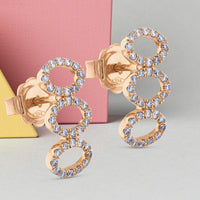 Pendientes_GeometriCh_de_oro_rosa_con_3_ovales_verticales_de_diamantes