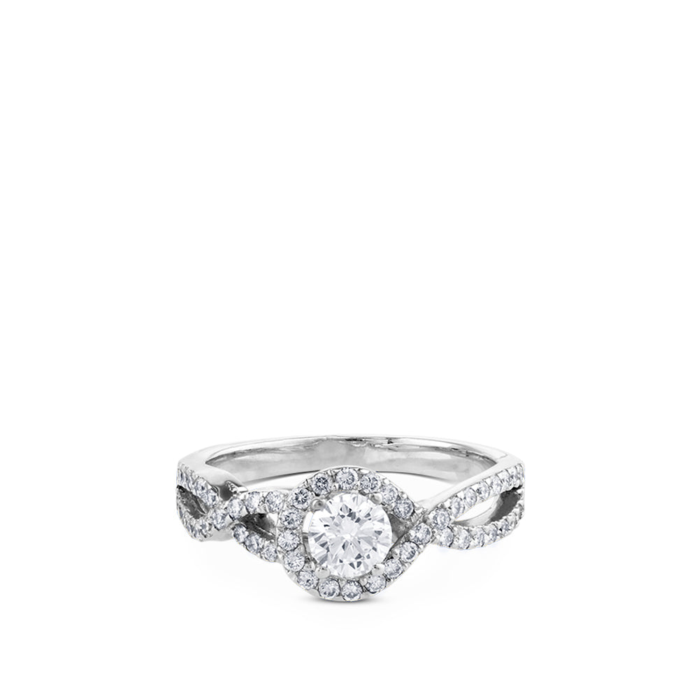 Solitario "Paola" de oro blanco con diamante central en garra y pavé en montura