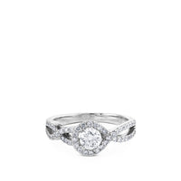 Solitario "Paola" de oro blanco con diamante central en garra y pavé en montura