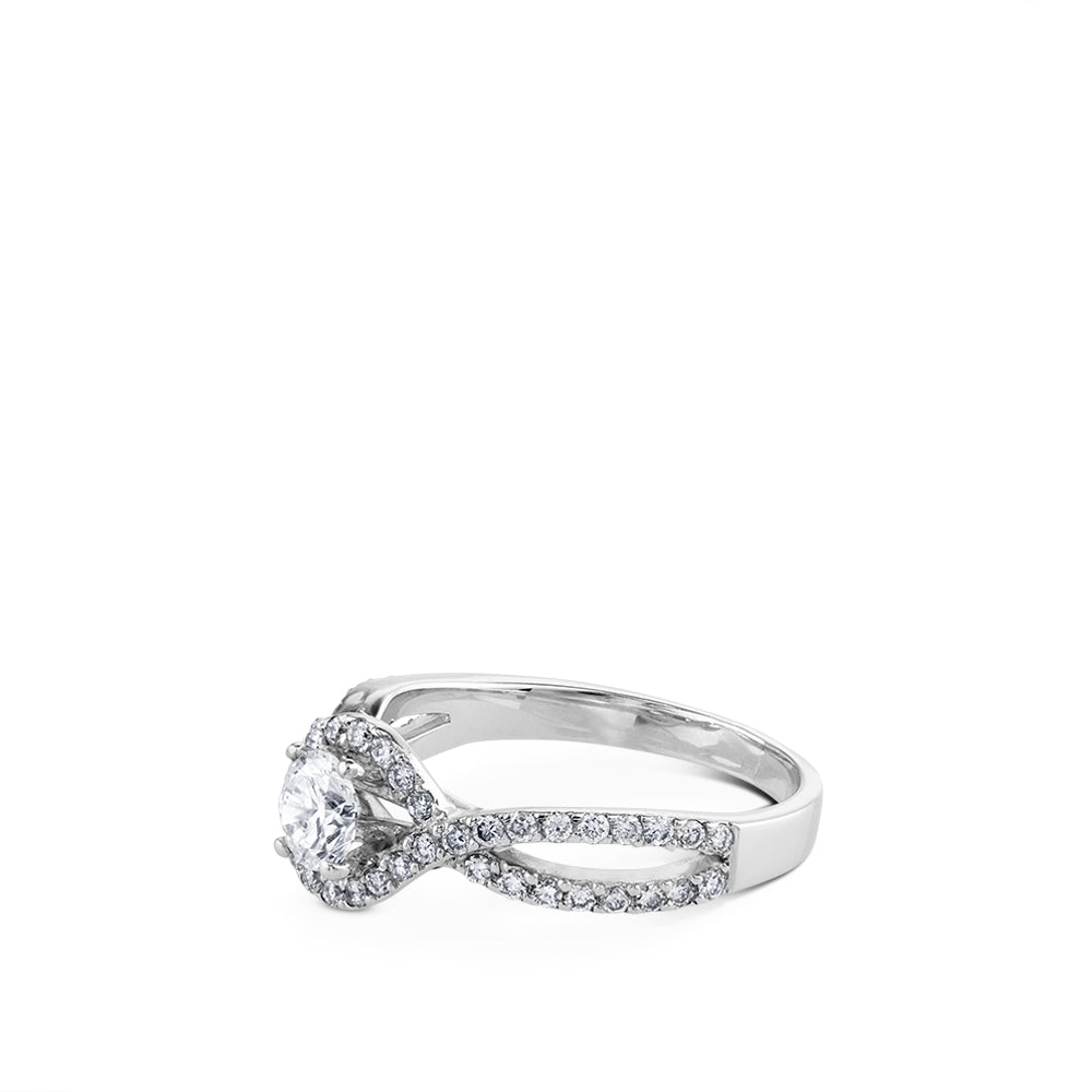 Solitario "Paola" de oro blanco con diamante central en garra y pavé en montura
