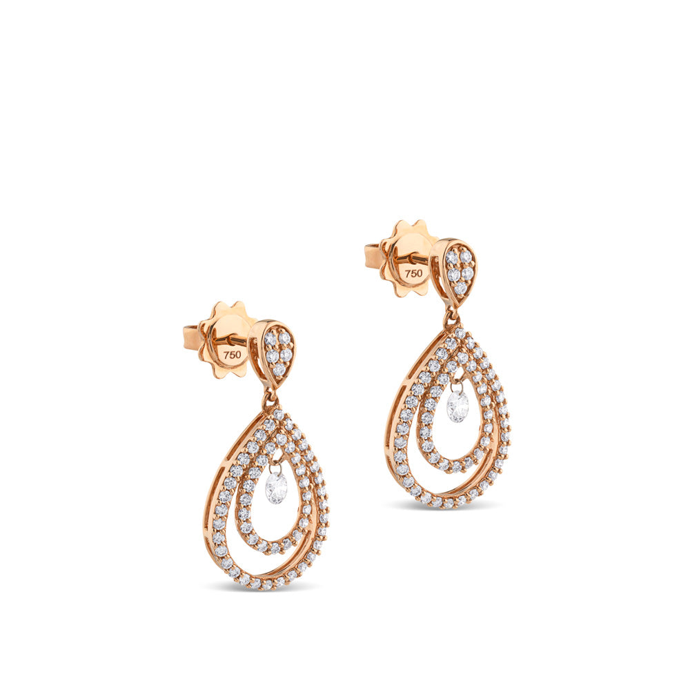Pendientes largos de oro rosa con lagrimas de diamantes y diamante al aire