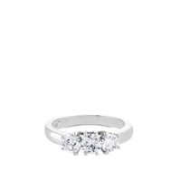 Tresillo de oro blanco con diamantes engastados en 4 garras