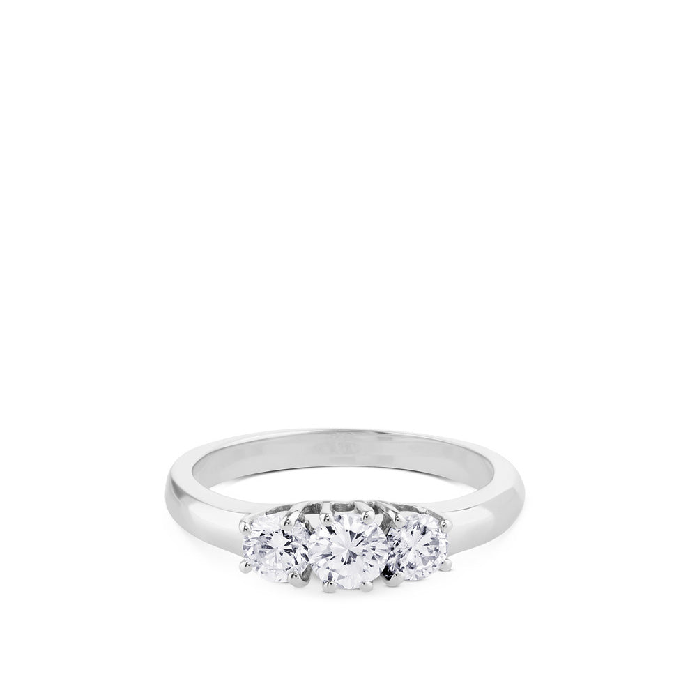 Tresillo de oro blanco con diamantes engastados en garras