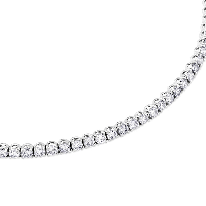 Pulsera Riviere de oro blanco con diamantes en garra de 3,76 quilates