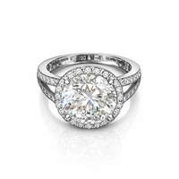 The Solitario sortija de oro blanco con diamante central 5cts talla brillante y orla de diamantes