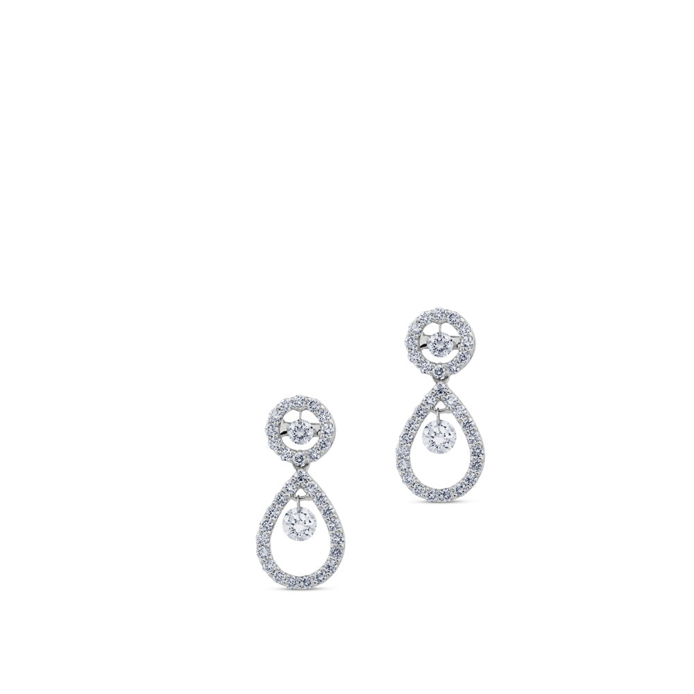 Pendientes largos de oro blanco con lágrima de diamantes y diamante al aire