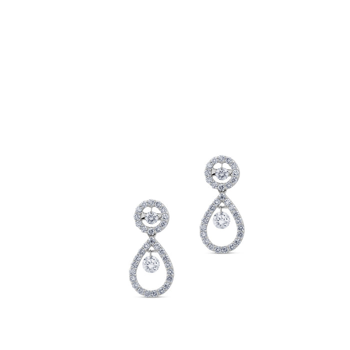 Pendientes largos de oro blanco con lágrima de diamantes y diamante al aire