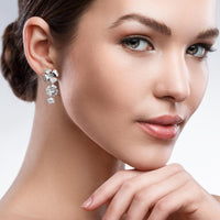Pendientes "Clover" largos de oro blanco con diamantes